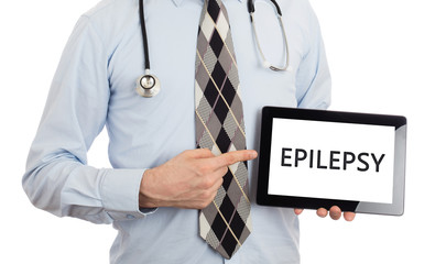 Doctor holding tablet - Epilepsy