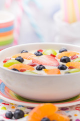 Colorful spring dessert vanilla pudding fruit
