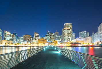 Naklejka premium empty footpath to modern office buildings near water in san fran