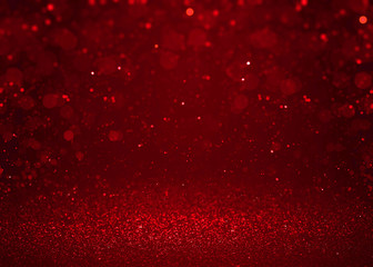 Red sparkle glitter abstract background.