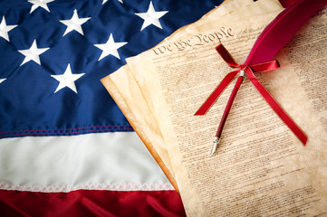 Life, Liberty the pursuit of Happiness. The American flag, the US constitution and a fountain pen, can be used for 4th of july or any other patriotic holiday. Land of the free and home of the brave.