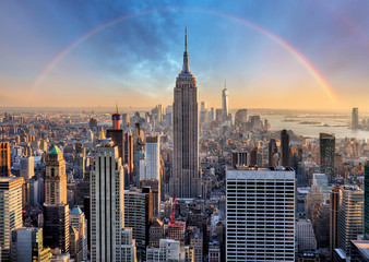 New York City skyline with urban skyscrapers and rainbow. - obrazy, fototapety, plakaty