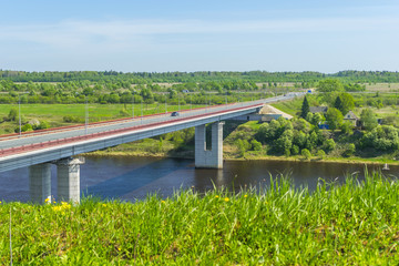 a bridge for cars over the river Volkhov