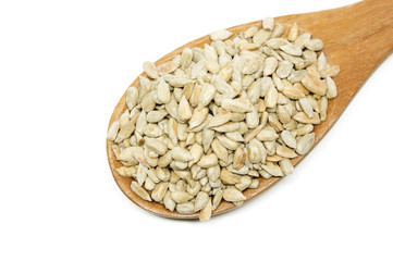 Sunflower seed with a wooden spoon.