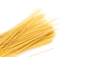 Raw spaghetti on white background.