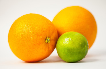 Fresh oranges and lime