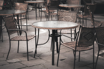 Street cafe tables and chairs in European city