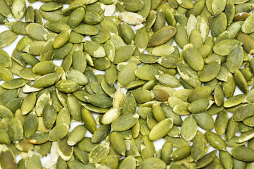 Pumpkin seeds on a white background