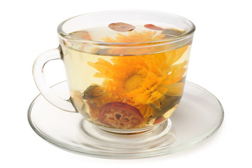 Green tea with chrysanthemum in glass cup