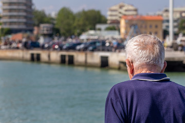 Fototapeta premium old man with a hearing aid