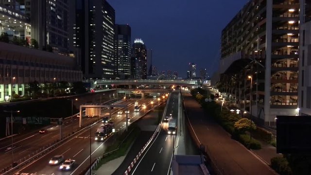 TOKYO -MAY 2016: Odaiba traffic at night. Tokyo attracts 5 million foreign people every year