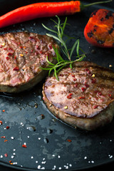 Grilled Beef steak with pepper, rosemary and salt