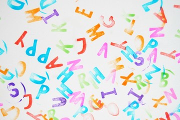 Favourite coloured alphabet stamps for children on a white background