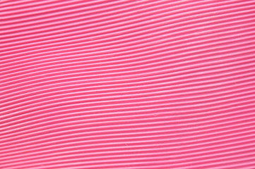 close up of pink rubber hot water bag texture