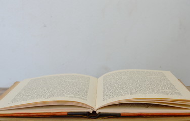 old book on wooden board