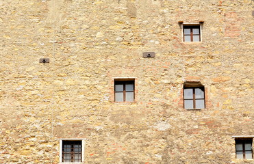 The small windows in the medieval castle.