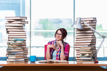Young female student preparing for exams