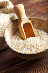 Buckwheat in wooden bowl and bag