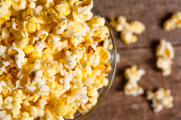 Popcorn on wooden background