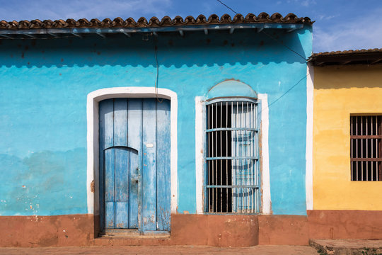 Colorful house facade in a street of Trinidad, Cuba