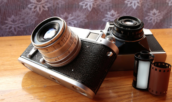 Vintage camera on wooden table