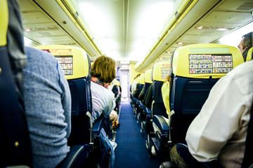 People sitting in commercial aircraft.