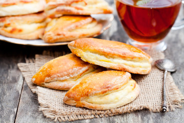 Homemade  cottage cheese pies with a cup oftea