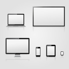 Modern technology devices - lcd tv screen, computer monitor, laptop, digital tablet, smart watch and mobile phone with blank screen