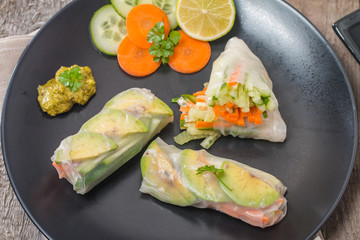 Spring rolls with vegetables and avocado 