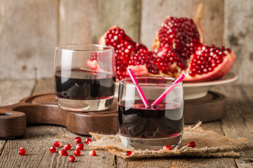 Ripe pomegranates with juice 