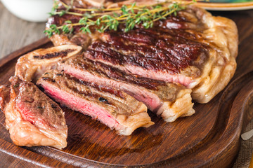 Beef steaks with grilled vegetables and seasoning 