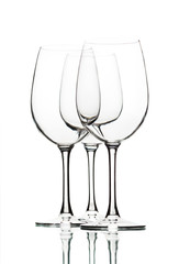 Empty wine glasses on white