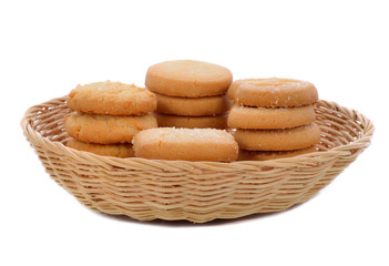 butter cookie in the basket isolated on white background