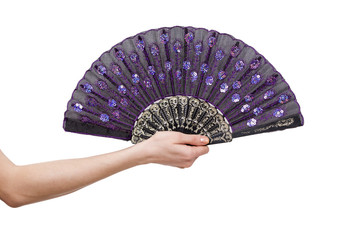 Hand holding fan isolated on white background