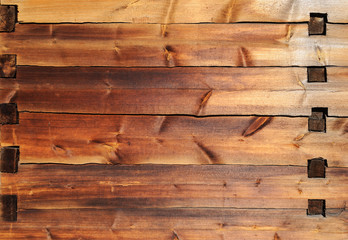 Old wooden beam jointed wall