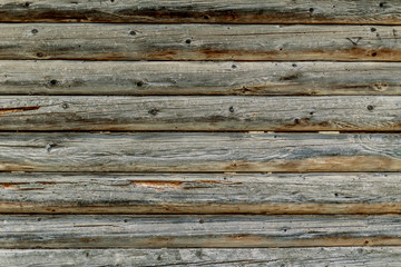 Fototapeta premium Wall of old wooden cabin, dark texture