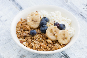 healthy breakfast with cottage cheese, granola and fresh berries