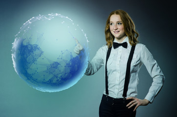 Woman pressing buttons on earth 