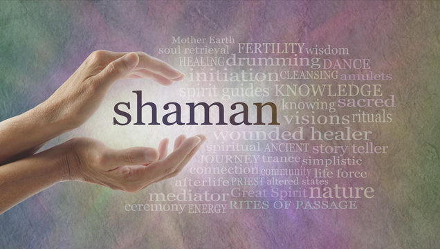 Shaman word cloud and healing hands - female cupped hands with the word SHAMAN between surrounded by white light on a stone effect background