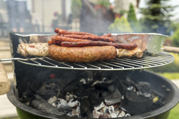barbecue with delicious grilled meat on grill