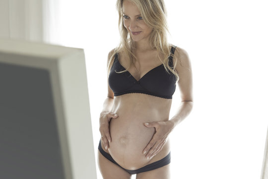 Pregnant woman smiling