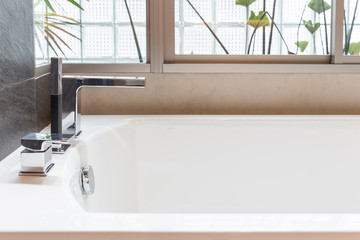 closeup bathtub faucet