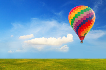 Hot air balloon on blue sky
