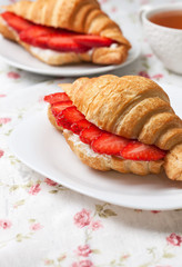 croissant with fresh strawberries, ricotta