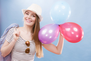 Woman summer joyful girl with colorful balloons