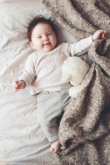 Cute baby in the bed