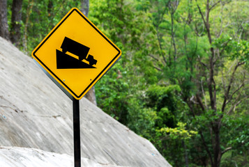 Steep Hill Descent Use Low Gear Traffic Sign on the Road in Mountain of Thailand