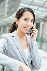 Businesswoman talk to mobile phone