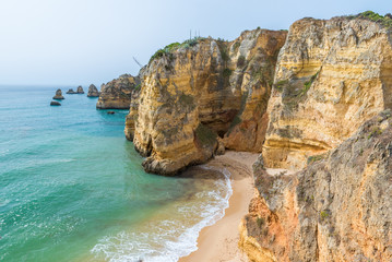 Fototapeta na wymiar Praia de Dona Ana - beautiful beach of Algarve, Portugal
