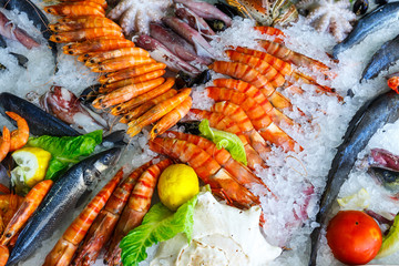 fresh seafood in the fridge of the seafood restaurant in Crete, Greece